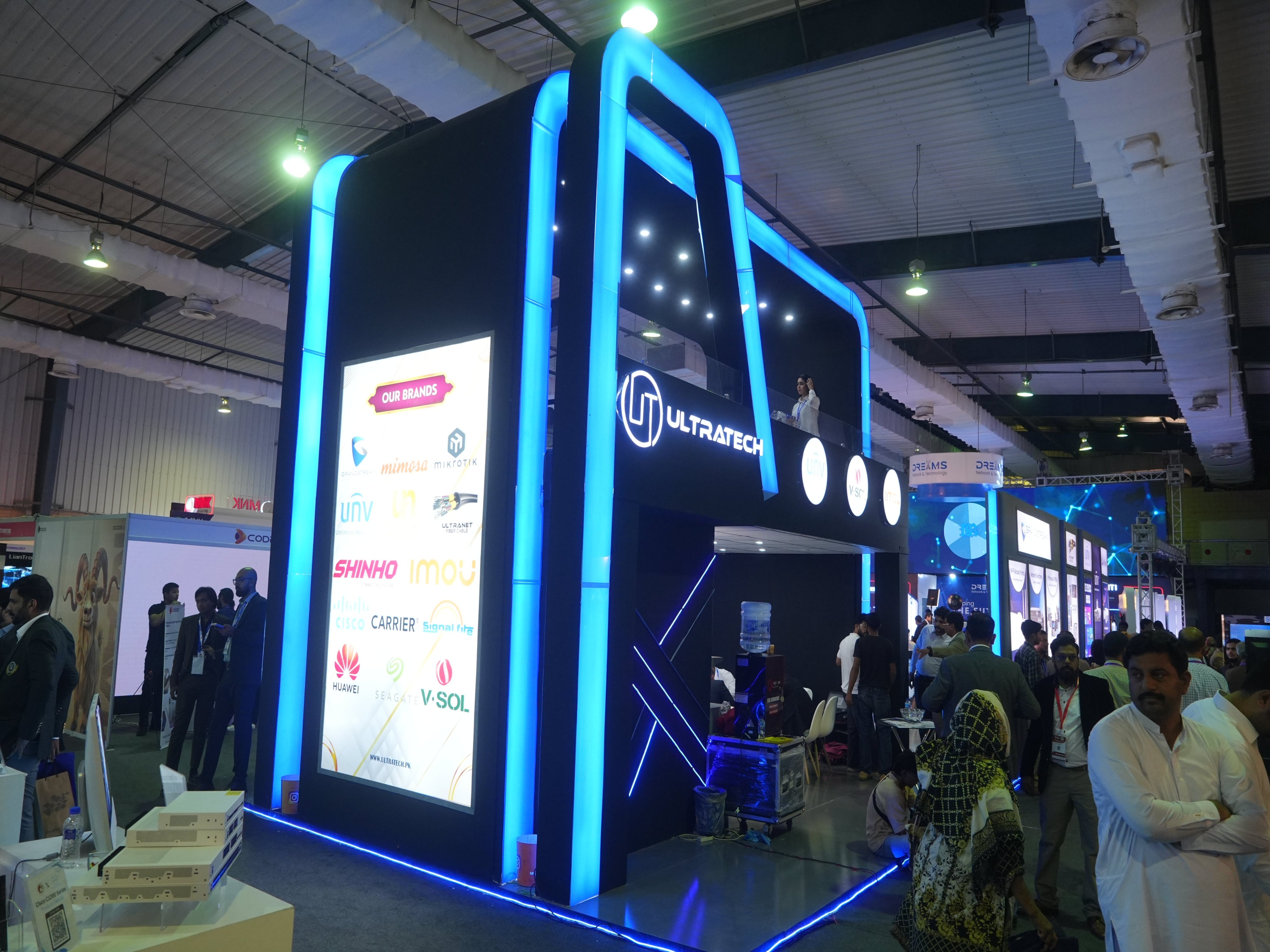 Exhibition stand with UltraTech logo at a trade show
